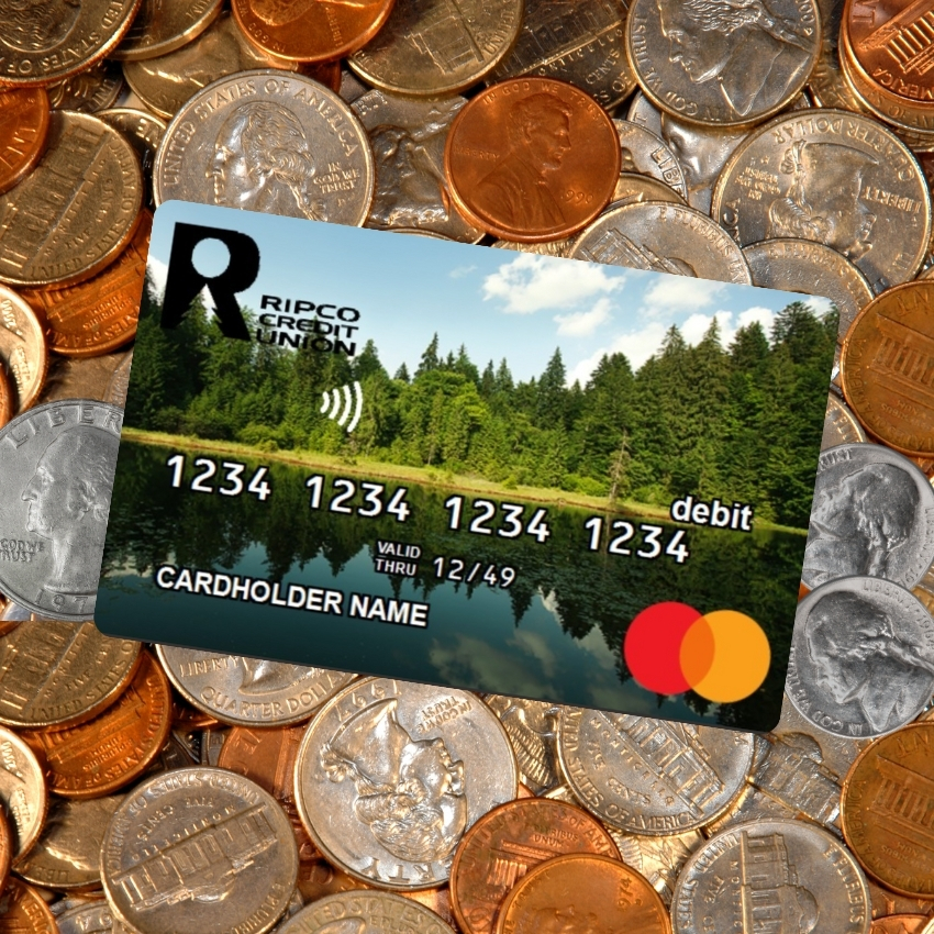 Ripco debit card on top of a background of coins